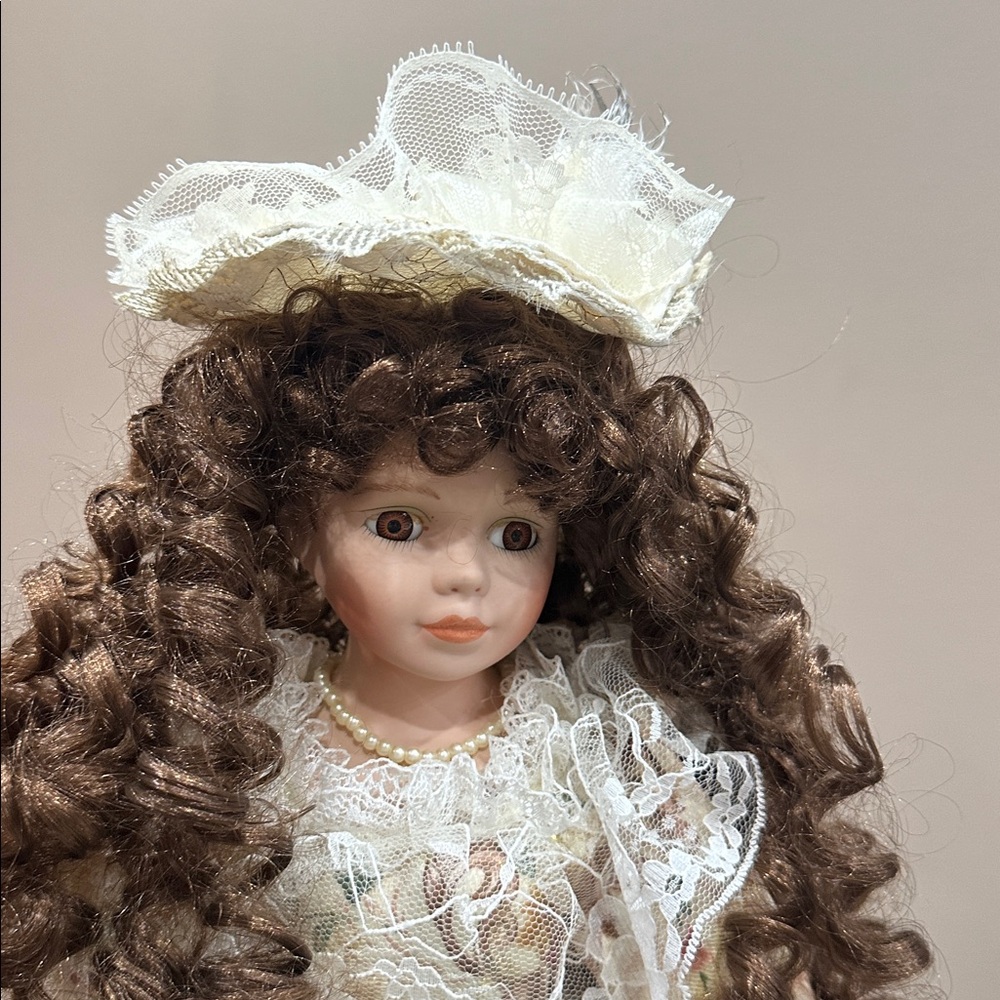 Porcelain Victorian-Style Doll in Cream and Brown - Picture 2 of 6